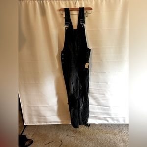 FREE PEOPLE SUPER SLOUCHY OVERALLS in black. Size small